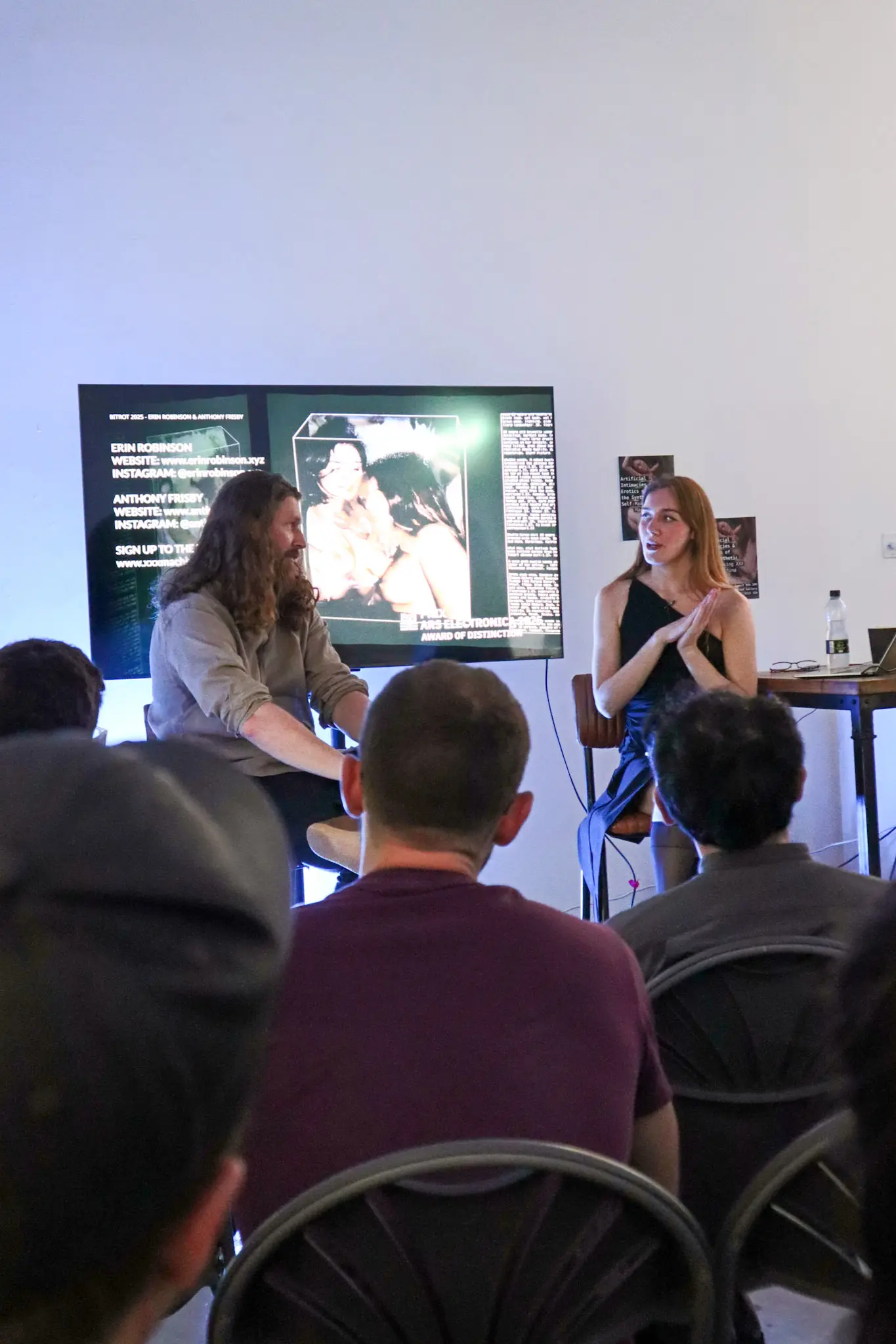Close-up of speaker presenting at Artificial Intimacies event