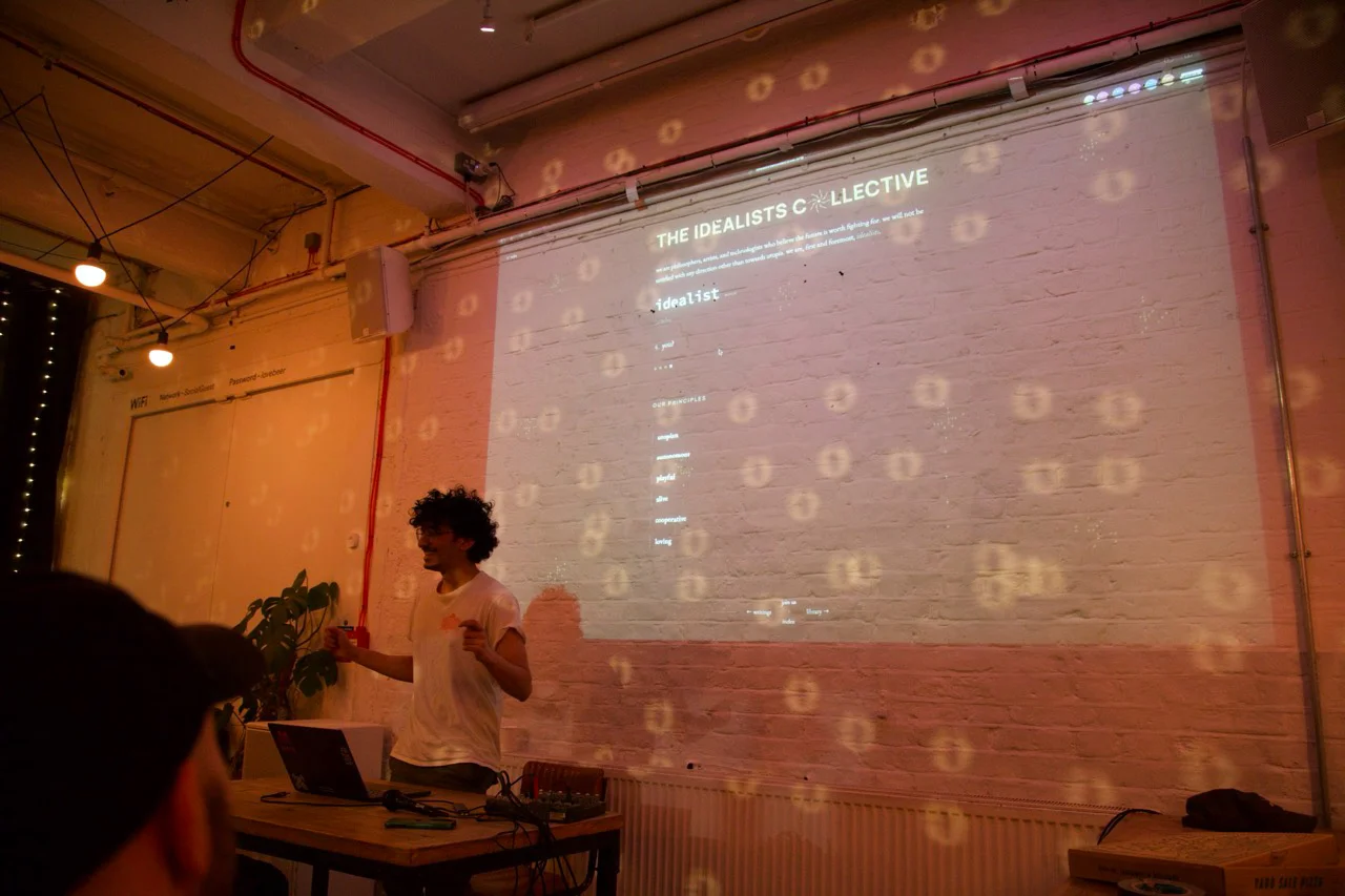 Person presenting at open projector event