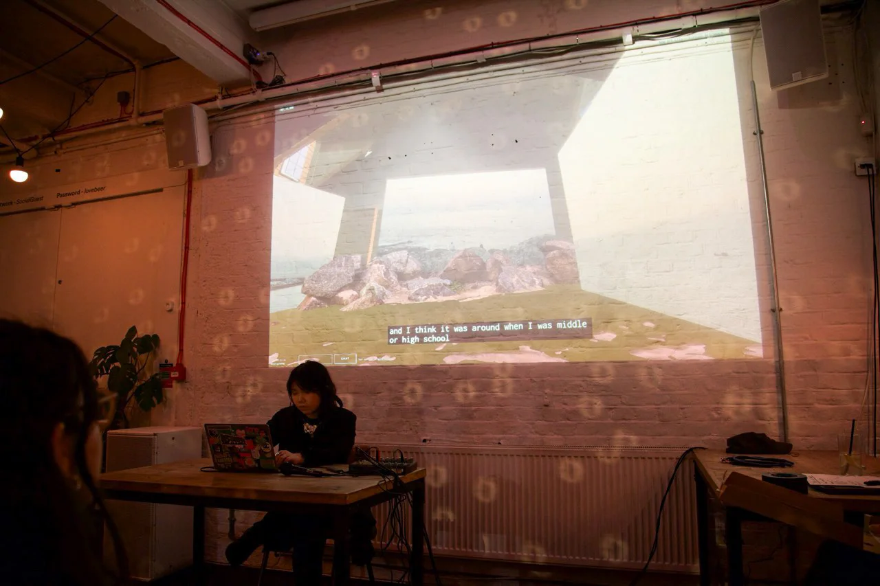 Person presenting at open projector event