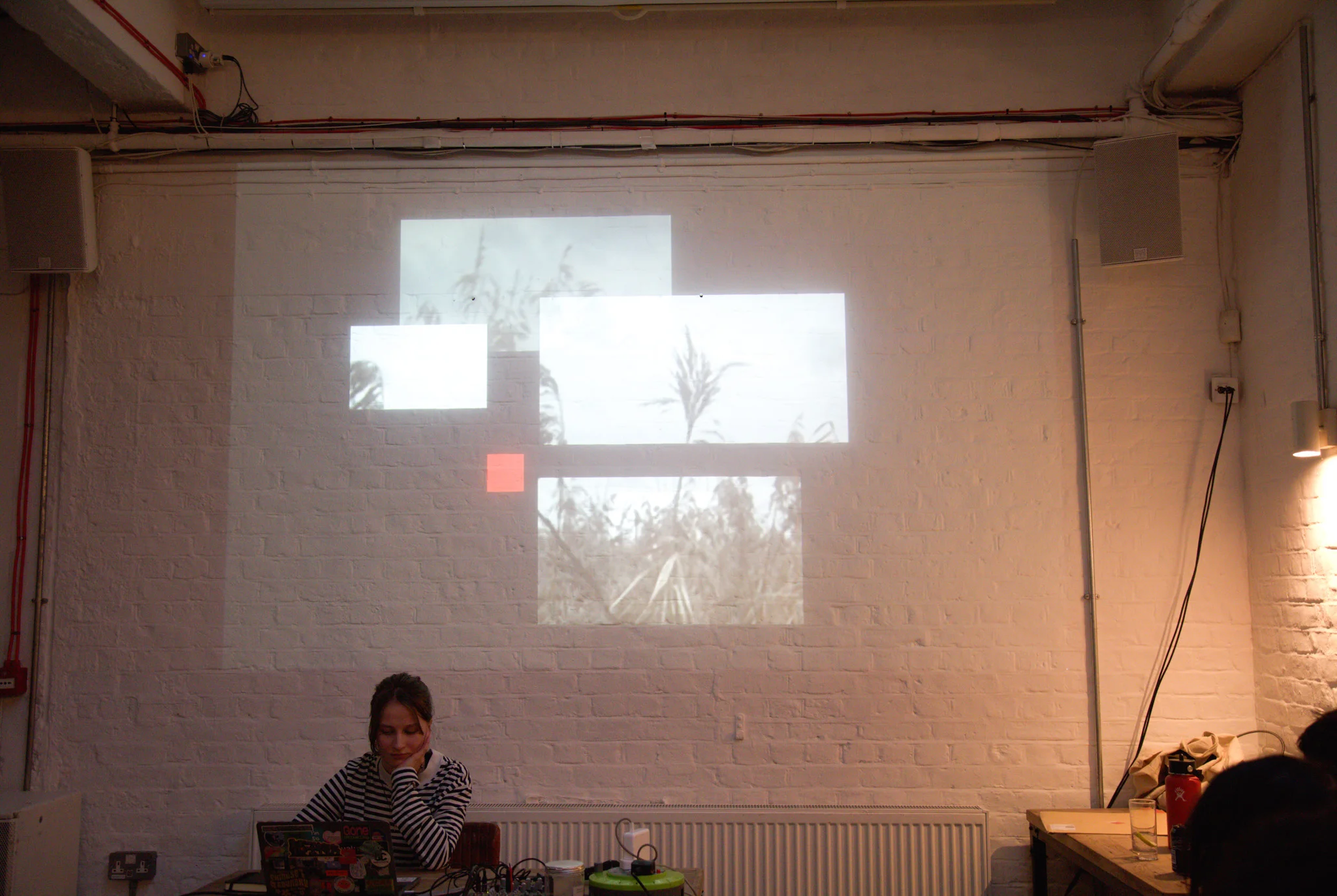 Person presenting at open projector event
