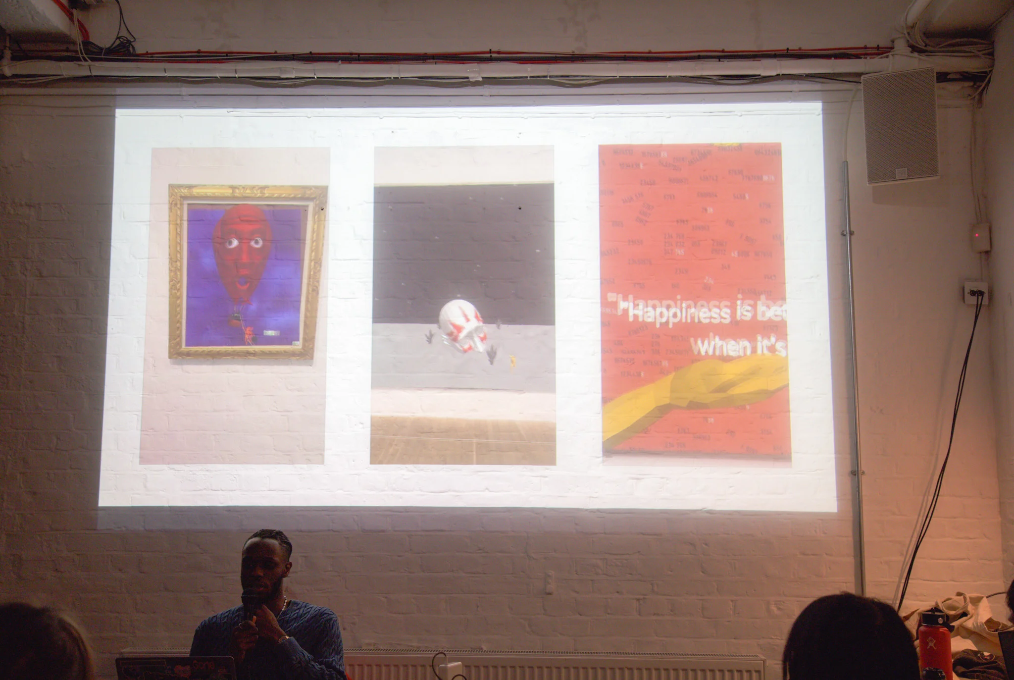 Person presenting at open projector event