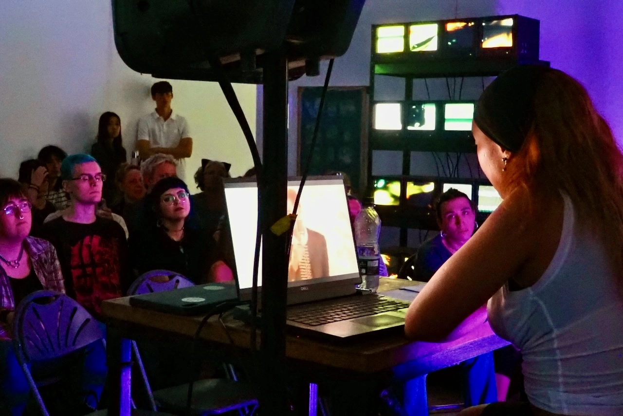 Dian Joy presenting Long Live The New Flesh (or Whatever) at Phreaking Collective's BitRot exhibition, London, 2025