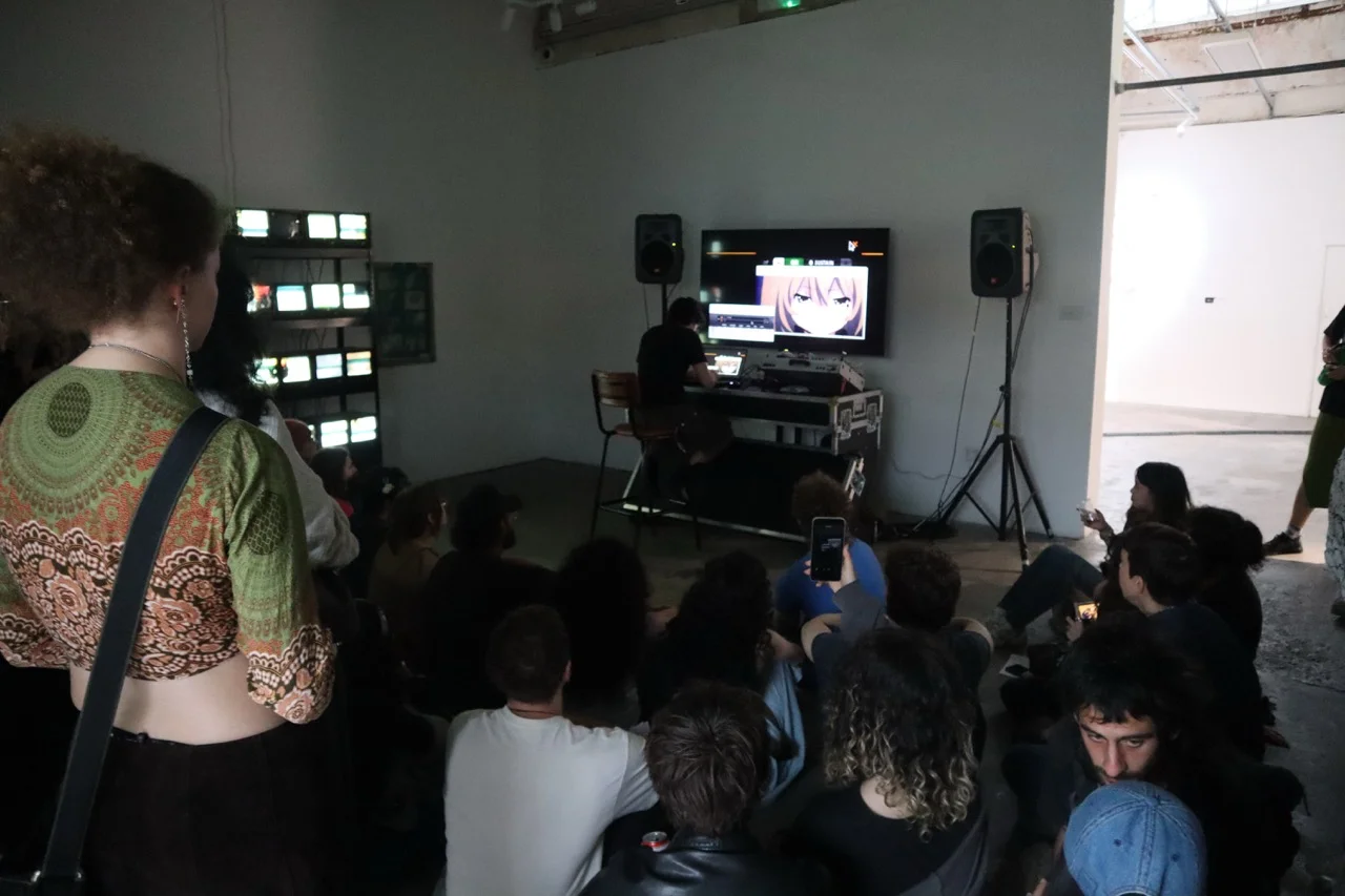 Audience watching Lagtime Seedling at Phreaking Collective's BitRot exhibition, London, 2025
